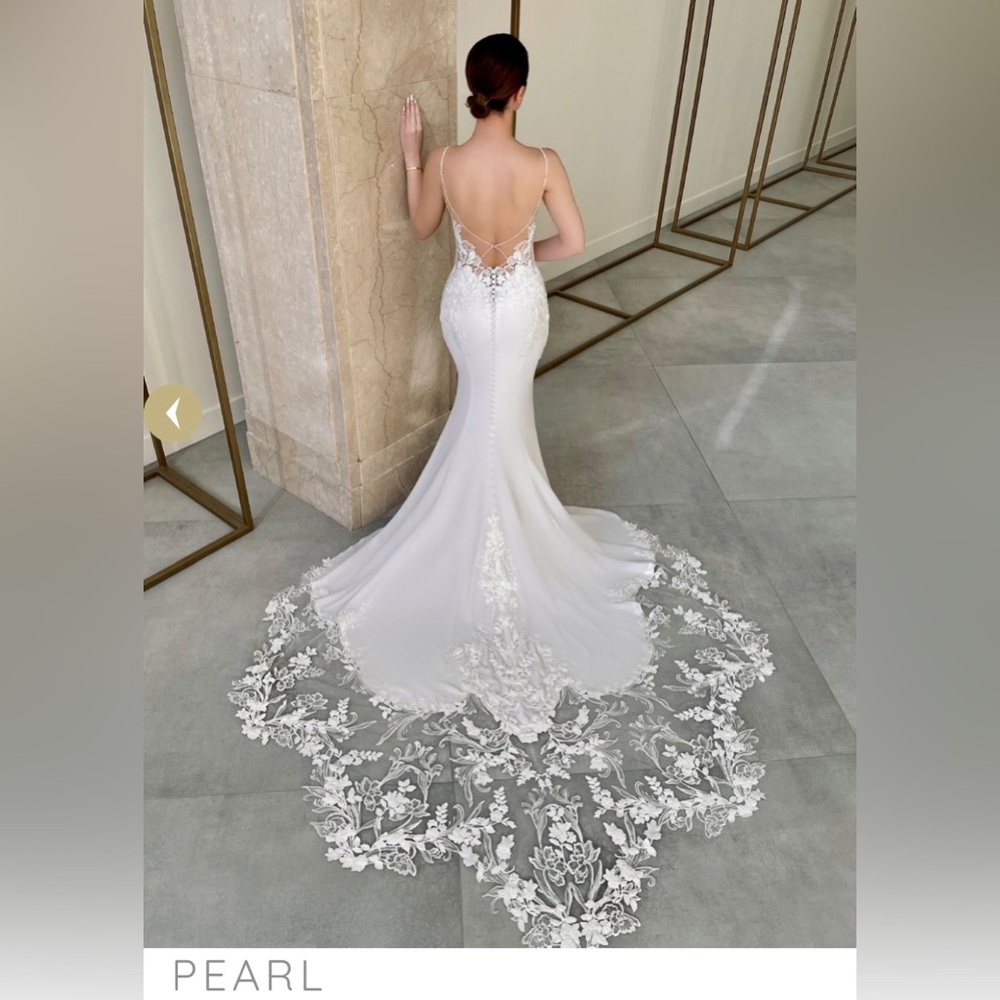 Brand New Wedding Dress- Never used, tag is still on dress.